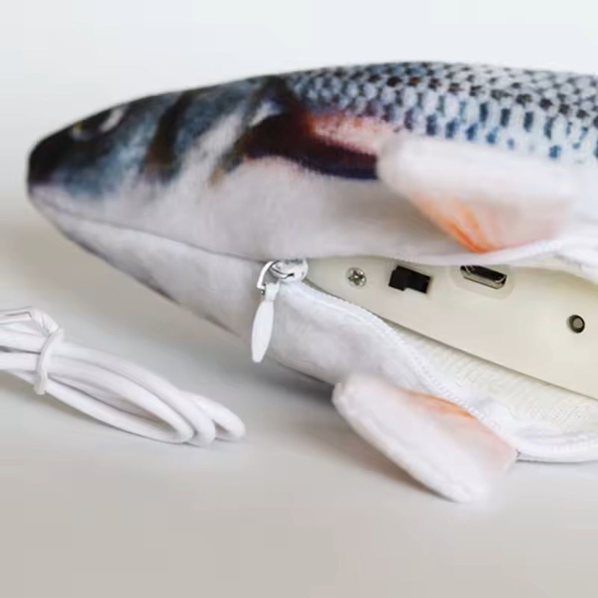 Grå sprellende fisk katteleke